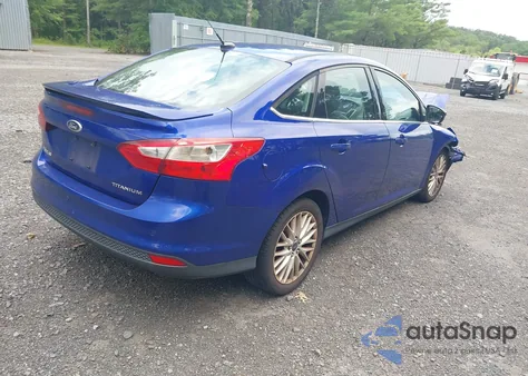 2013 Ford Focus Titanium z USA, uszkodzony, nr VIN 1FADP3J26DL116585